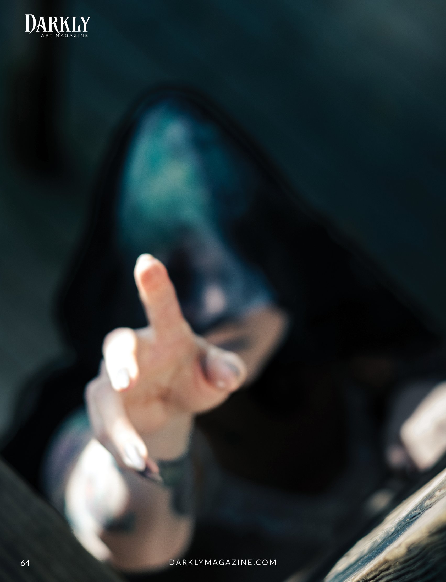 Darkly No Exit: hand lifting a veil