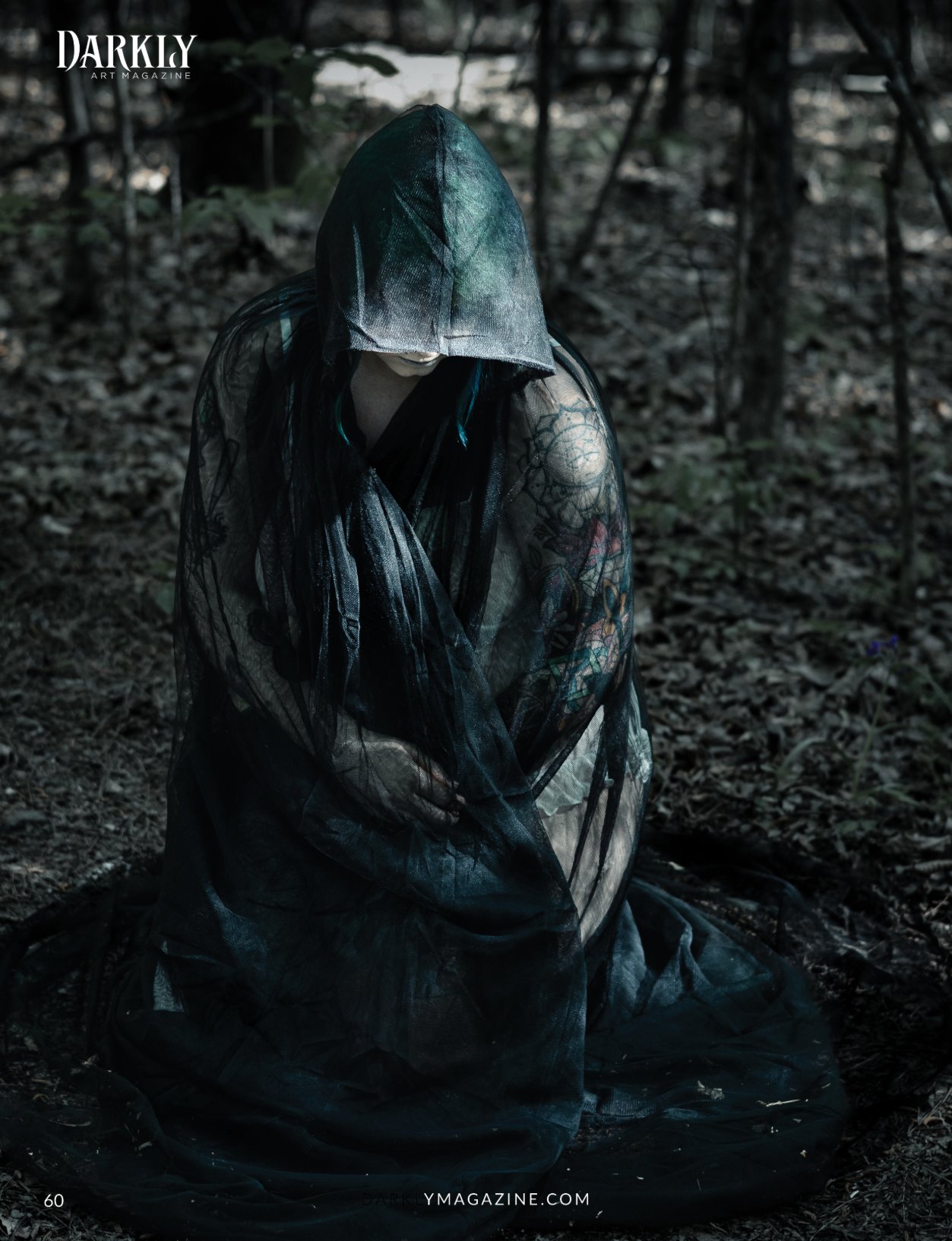 Darkly No Exit: hooded figure in dark woods